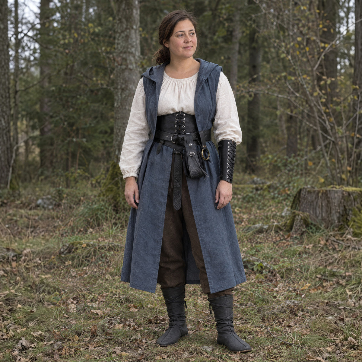 Mid-Calf Lace-Up Boots in a complete ranger outfit, worn by a woman outdoors