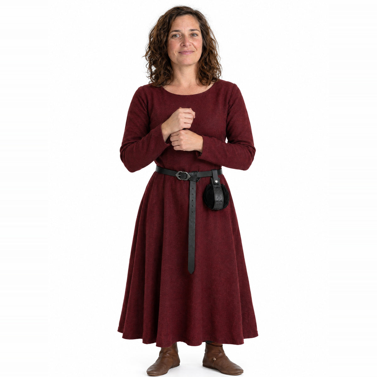 Black narrow belt with round pouch worn by a model on a white background