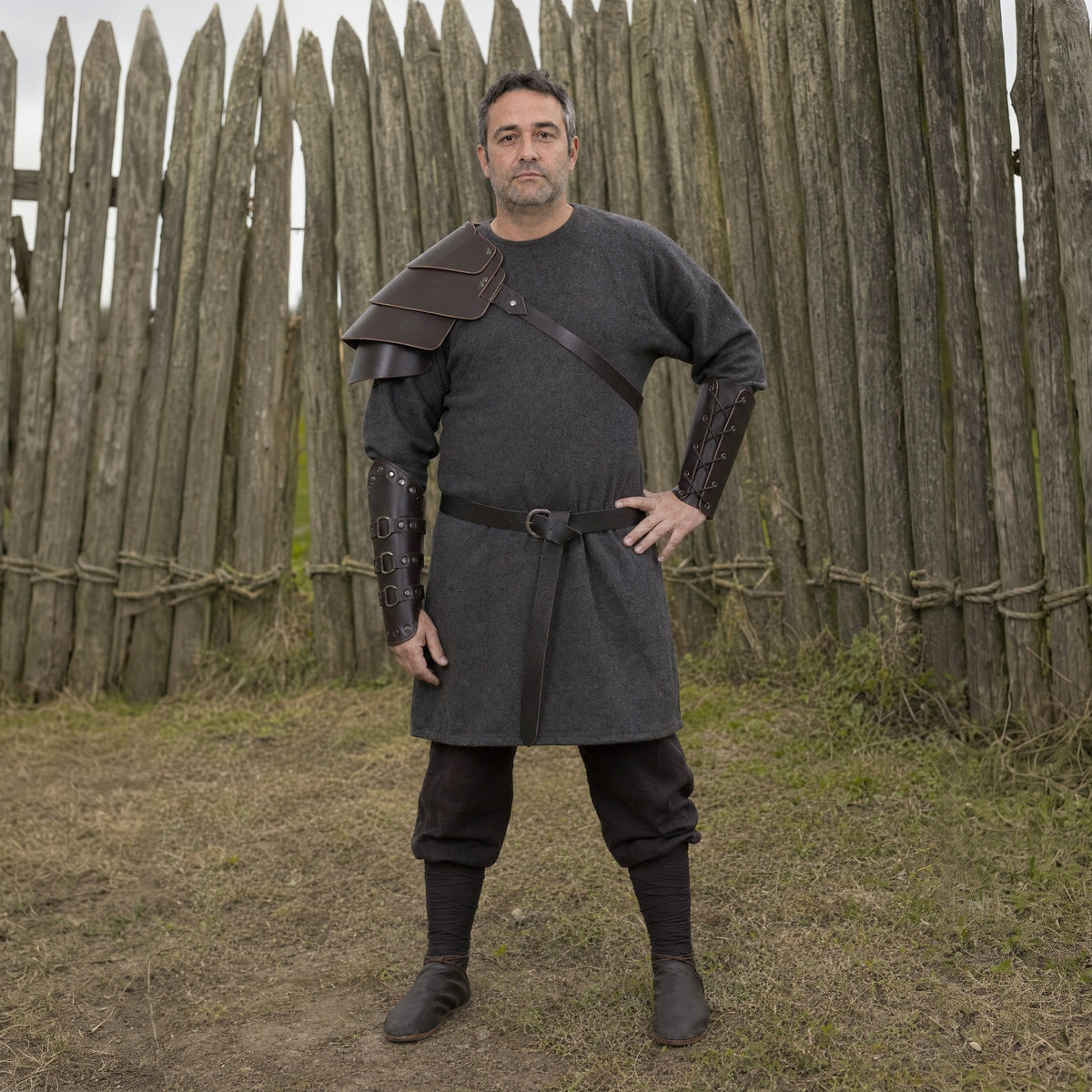 Brown pauldron and bracers set worn outdoors, full-length front view
