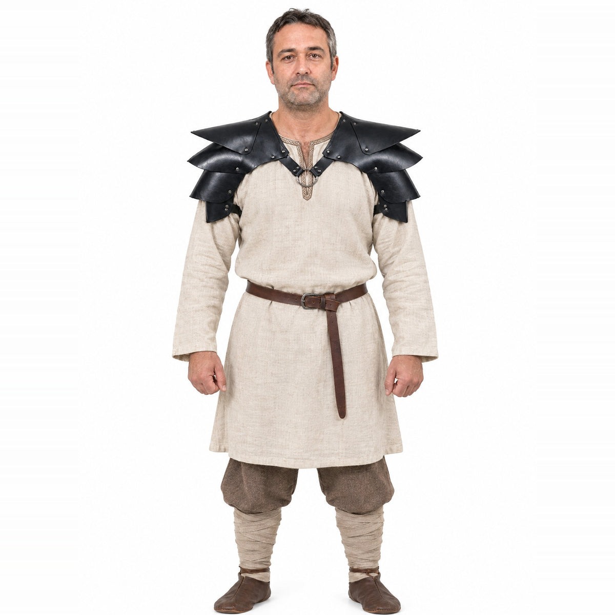Black pointed double shoulder armour worn by a model on a white background