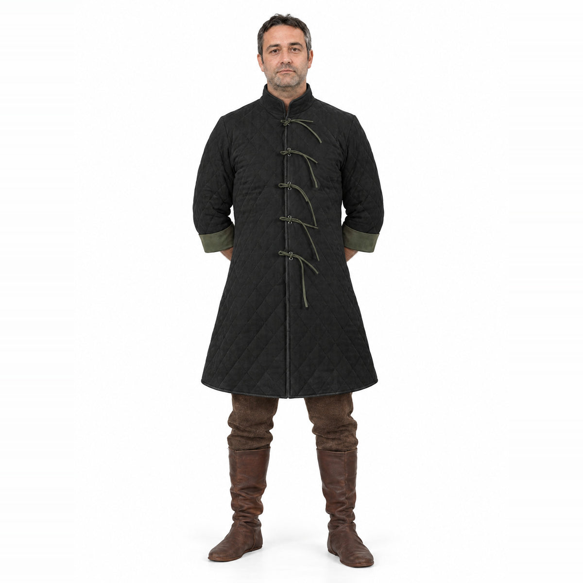 Black quilted padded coat worn by a model on a white background