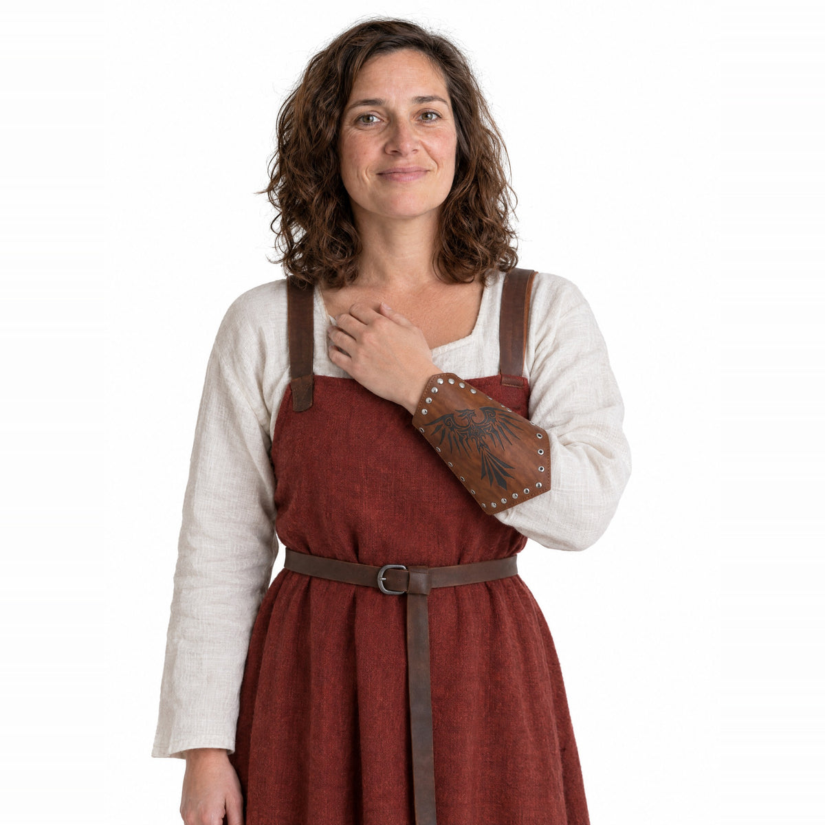 Brown raven bracer worn by a model on a white background