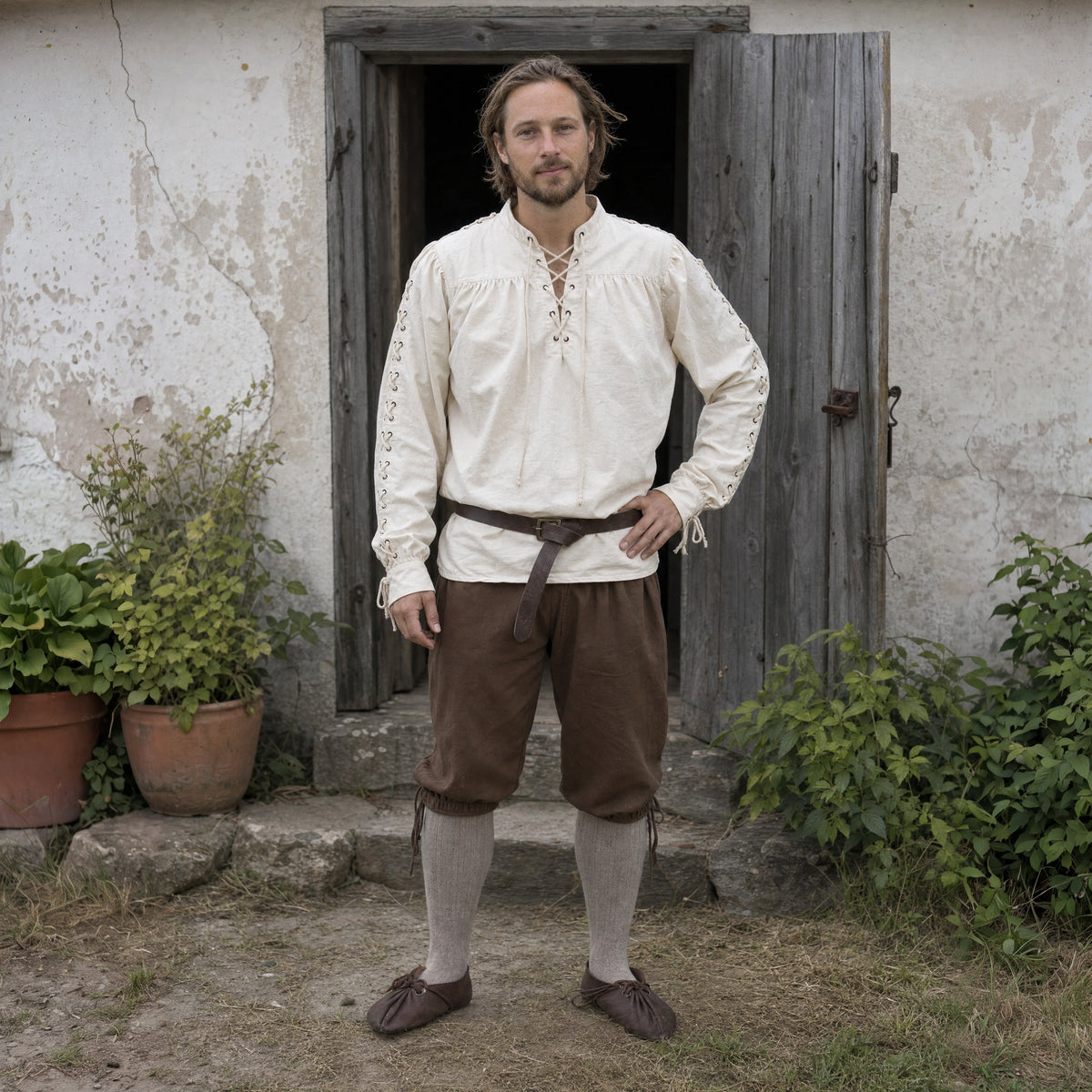 Off-White Renaissance shirt with laced sleeves worn by a man outdoors, full-length front view