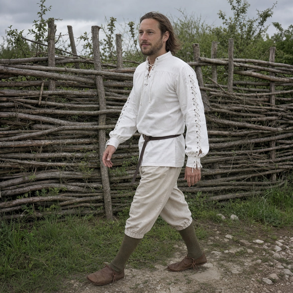 White Renaissance shirt with laced sleeves worn outdoors
