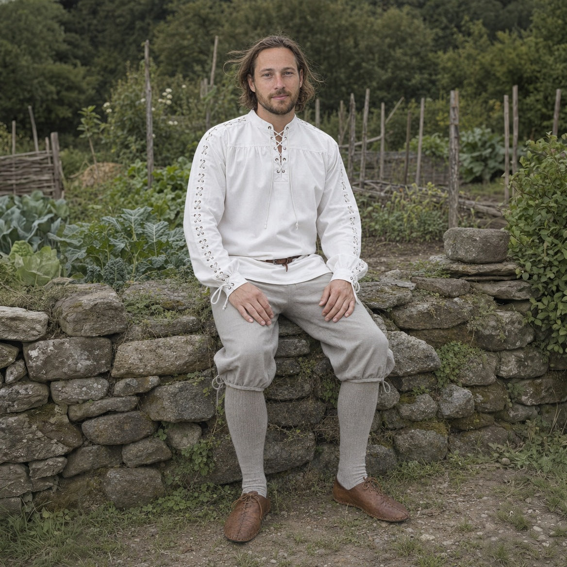 Renaissance shirt with laced sleeves styled with breeches and shoes