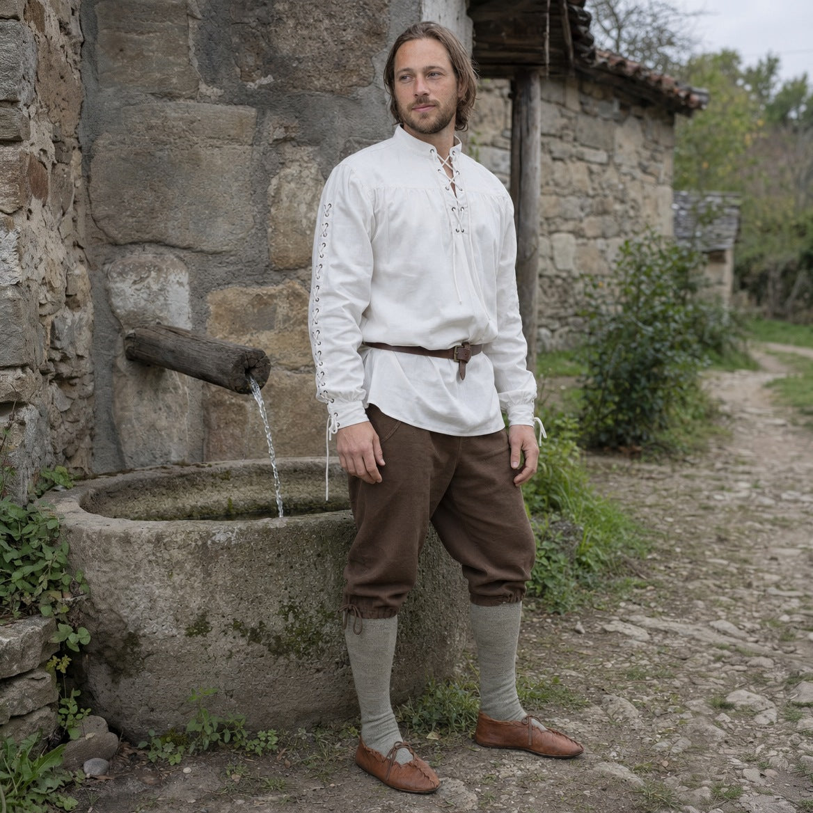 White Renaissance shirt, three-quarter view of the stand collar and laced sleeve