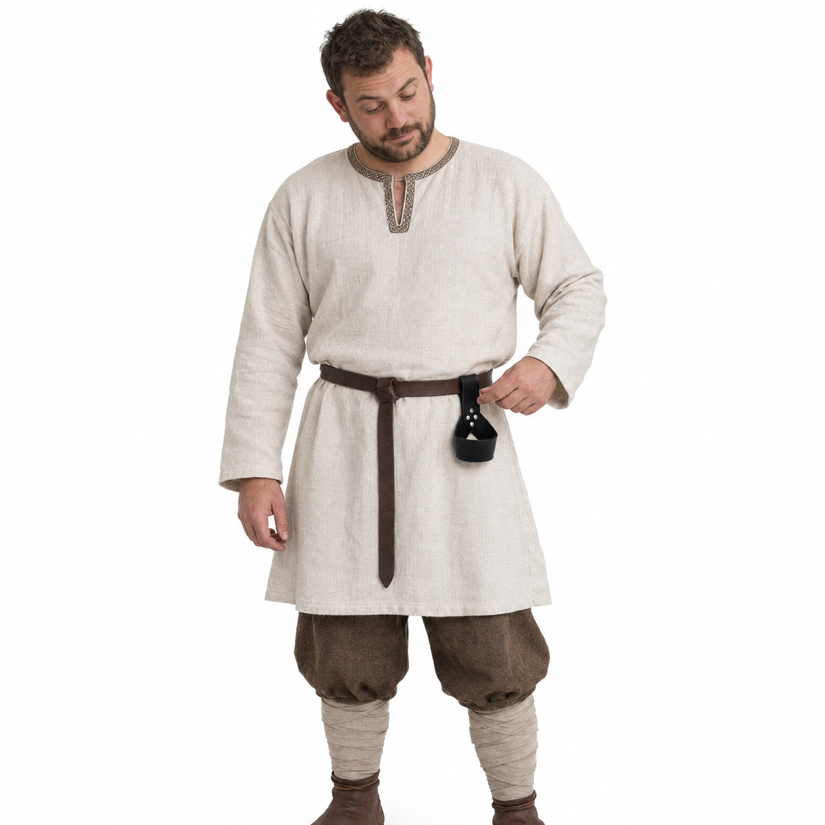 Black riveted belt frog for horn or sword worn by a model on a white background