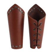 Brown riveted studded-edge bracers