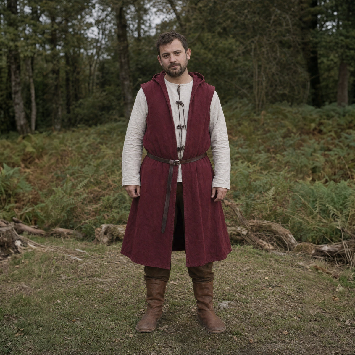Brick Red sleeveless hooded overcoat worn outdoors, full-length front view