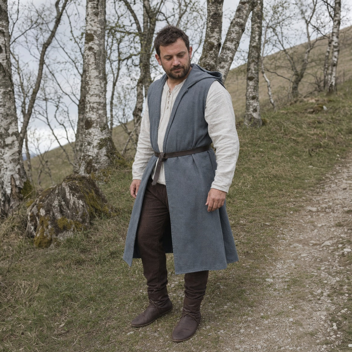 Grey sleeveless hooded overcoat, three-quarter view of the open front