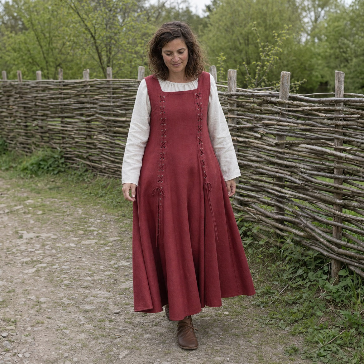 Red square-neck lace-up Renaissance dress worn outdoors