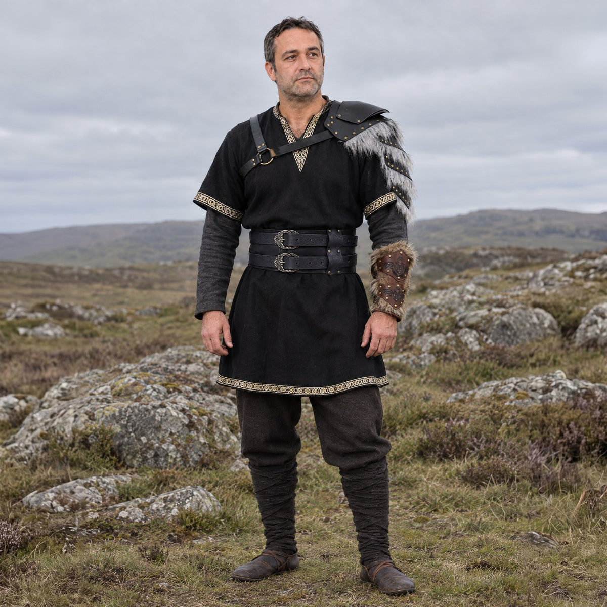 Studded Bracer with Fur-Look Trim in a complete dark warrior outfit, worn by a man outdoors