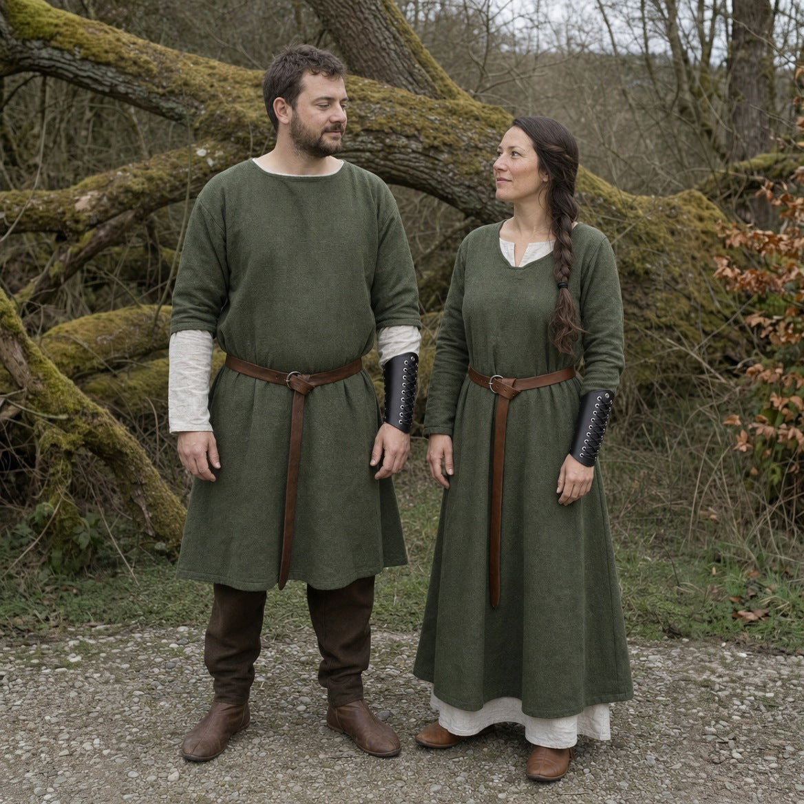 Tapered laced bracers styled with a tunic, a long dress and belts