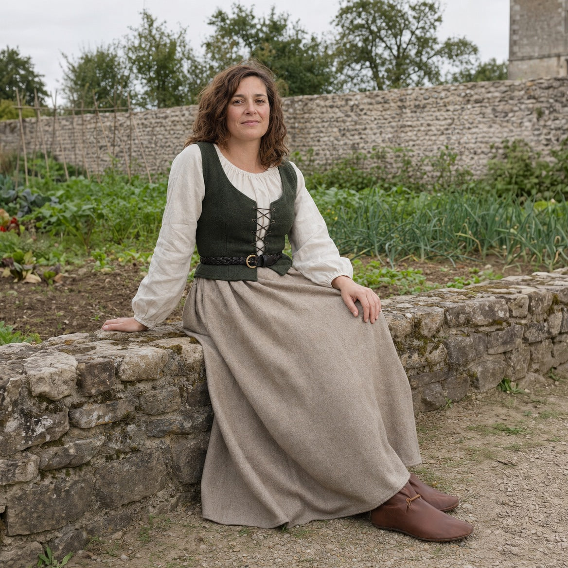 Thin braided leather belt styled over a peasant blouse and long skirt