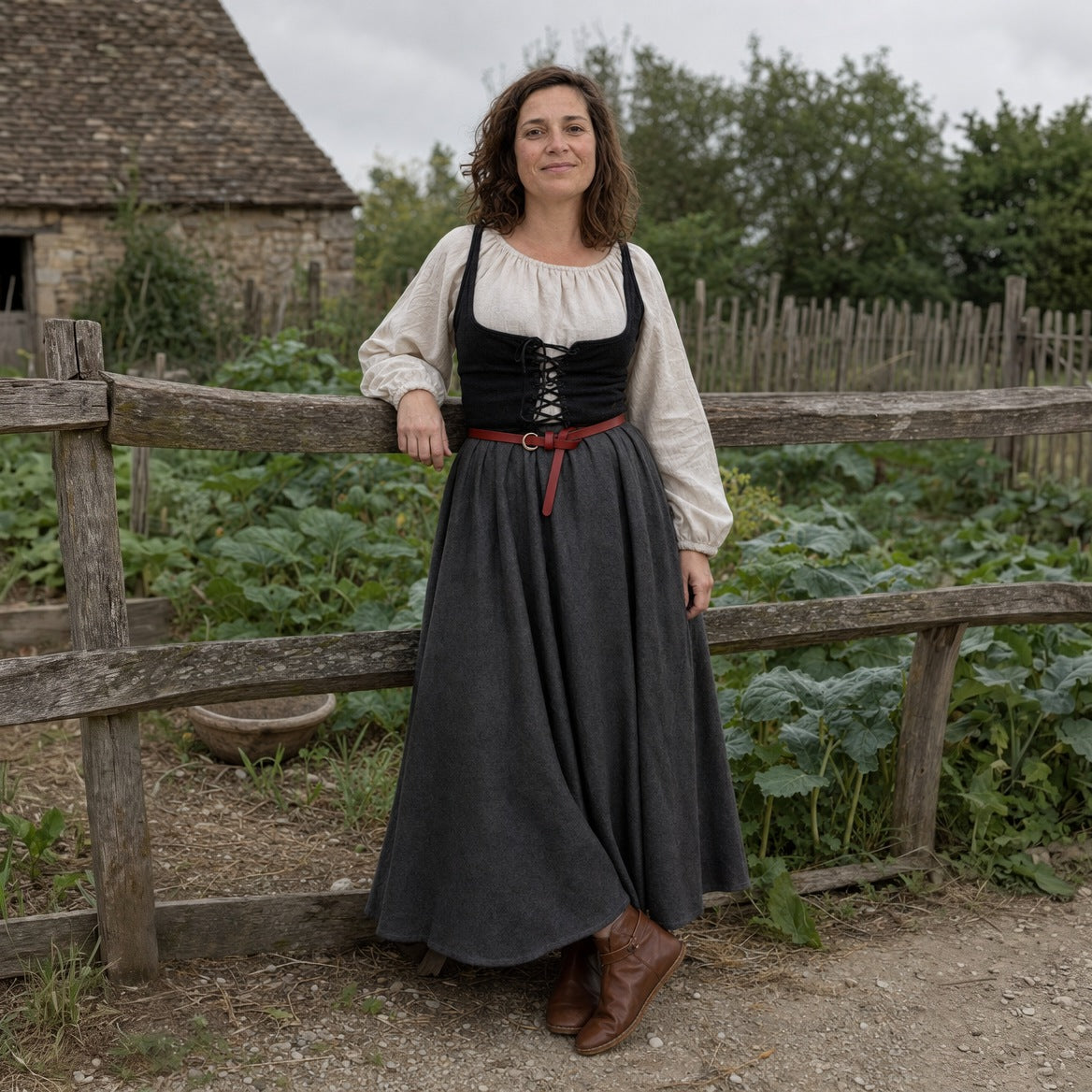 Thin leather ring belt styled over a plain peasant dress