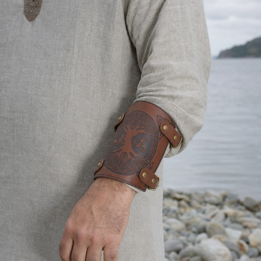Tree of life bracer on a forearm, showing the short 13.5 cm length above the wrist