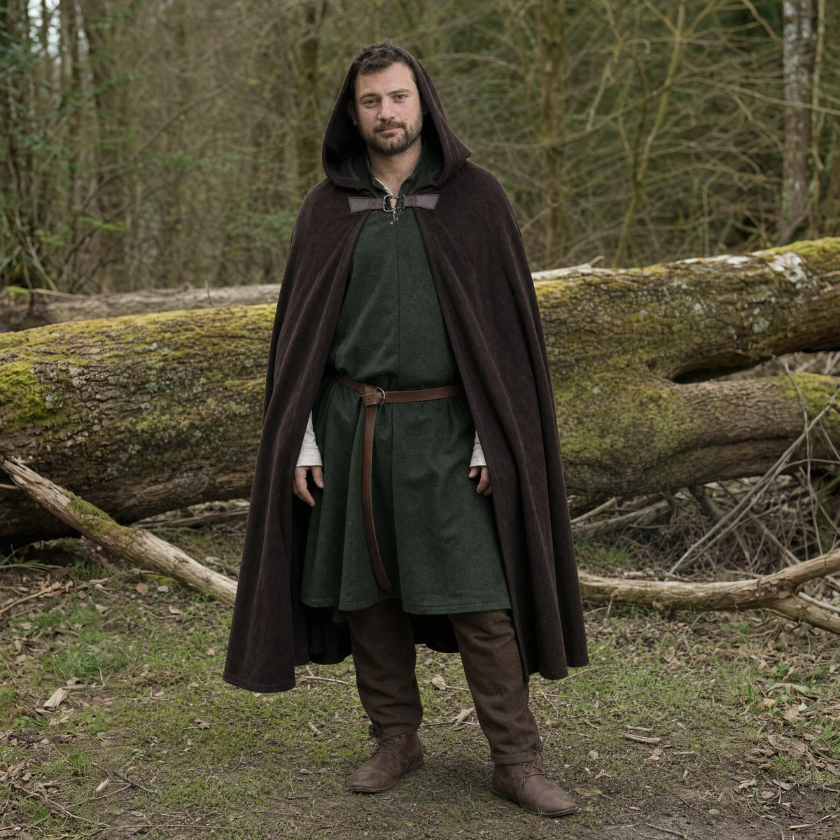 Brown velvet hooded cloak worn outdoors, full-length front view