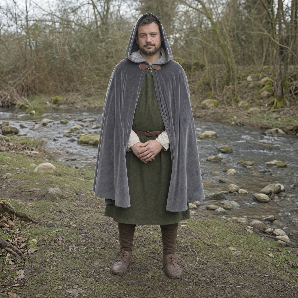 Grey velvet hooded cloak worn outdoors, full-length front view
