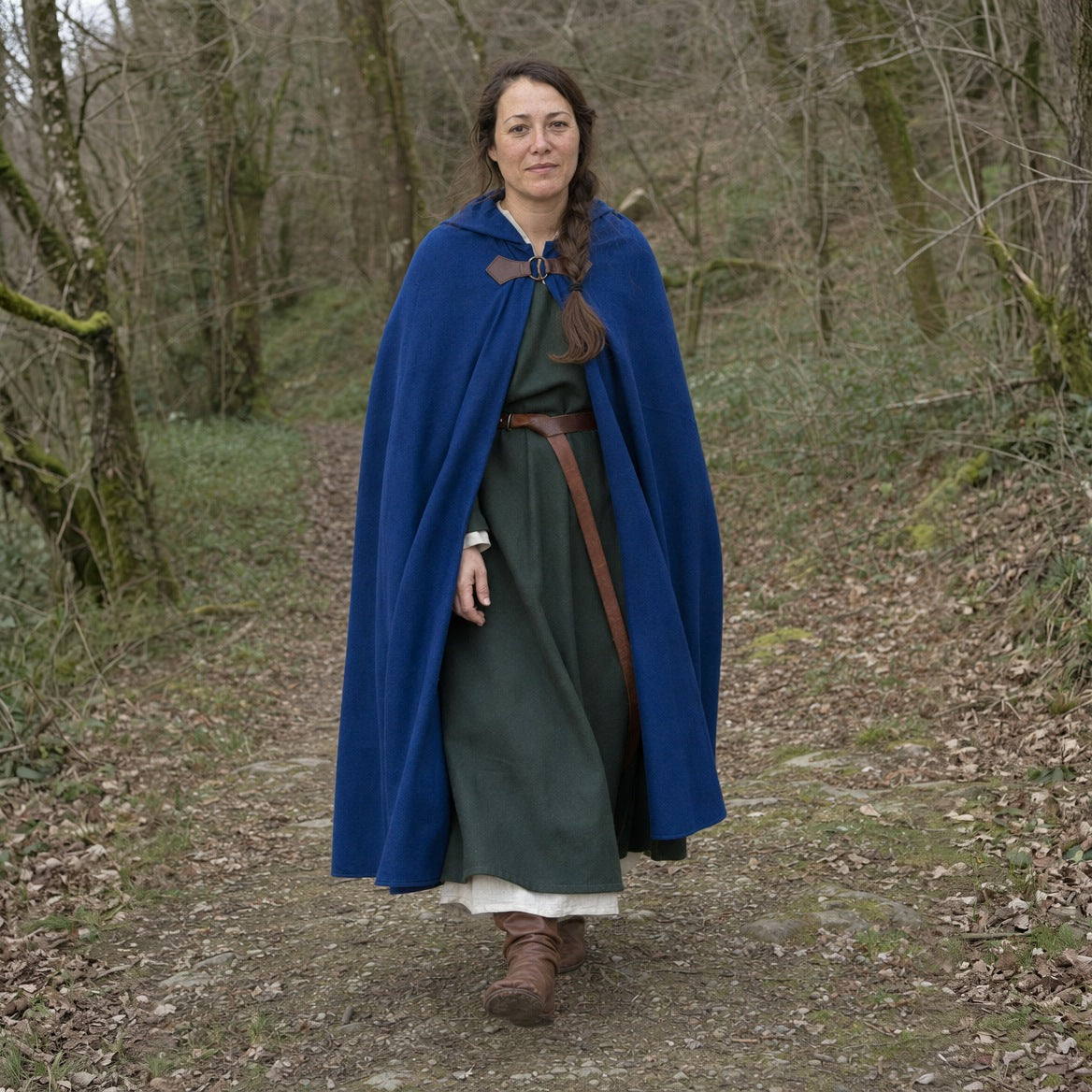 Blue velvet hooded cloak worn outdoors