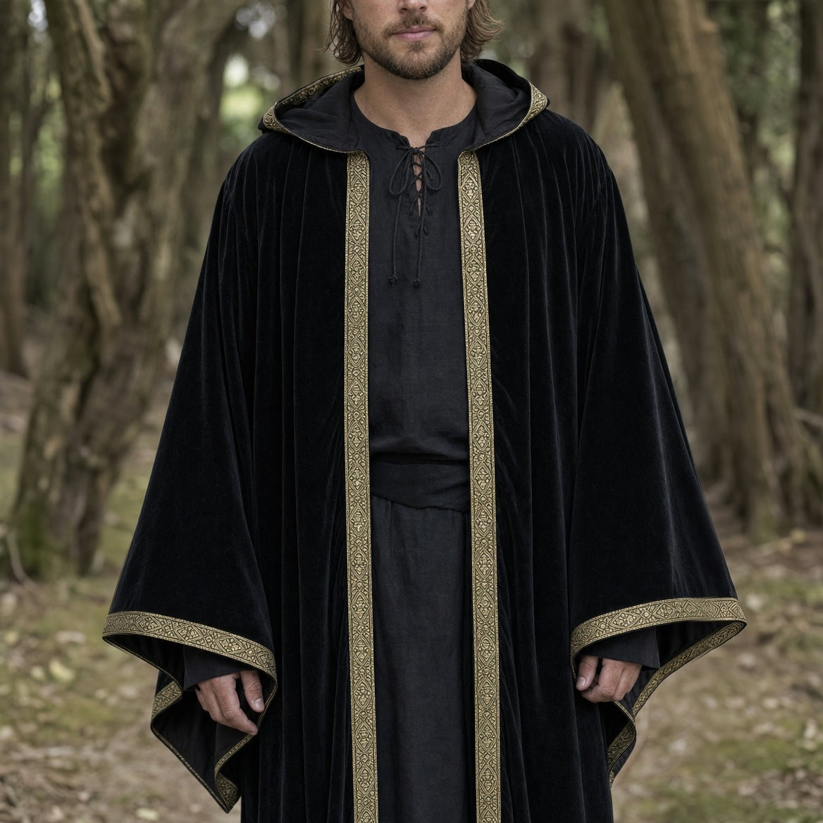 Velvet hooded robe on a wearer, showing the sleeve and hem length