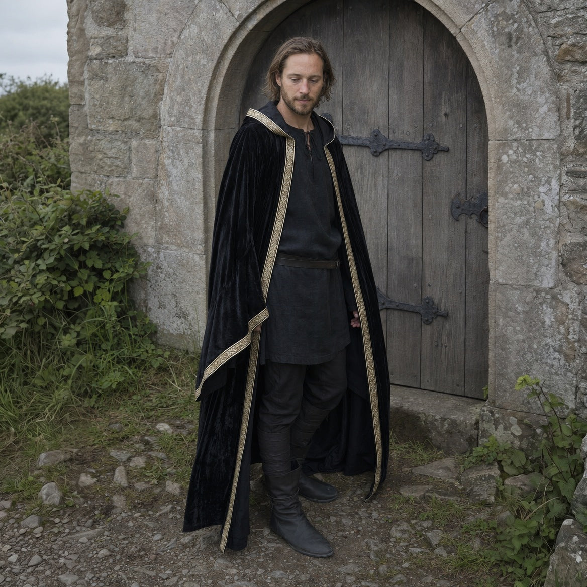 Black velvet hooded robe, three-quarter view of the printed border