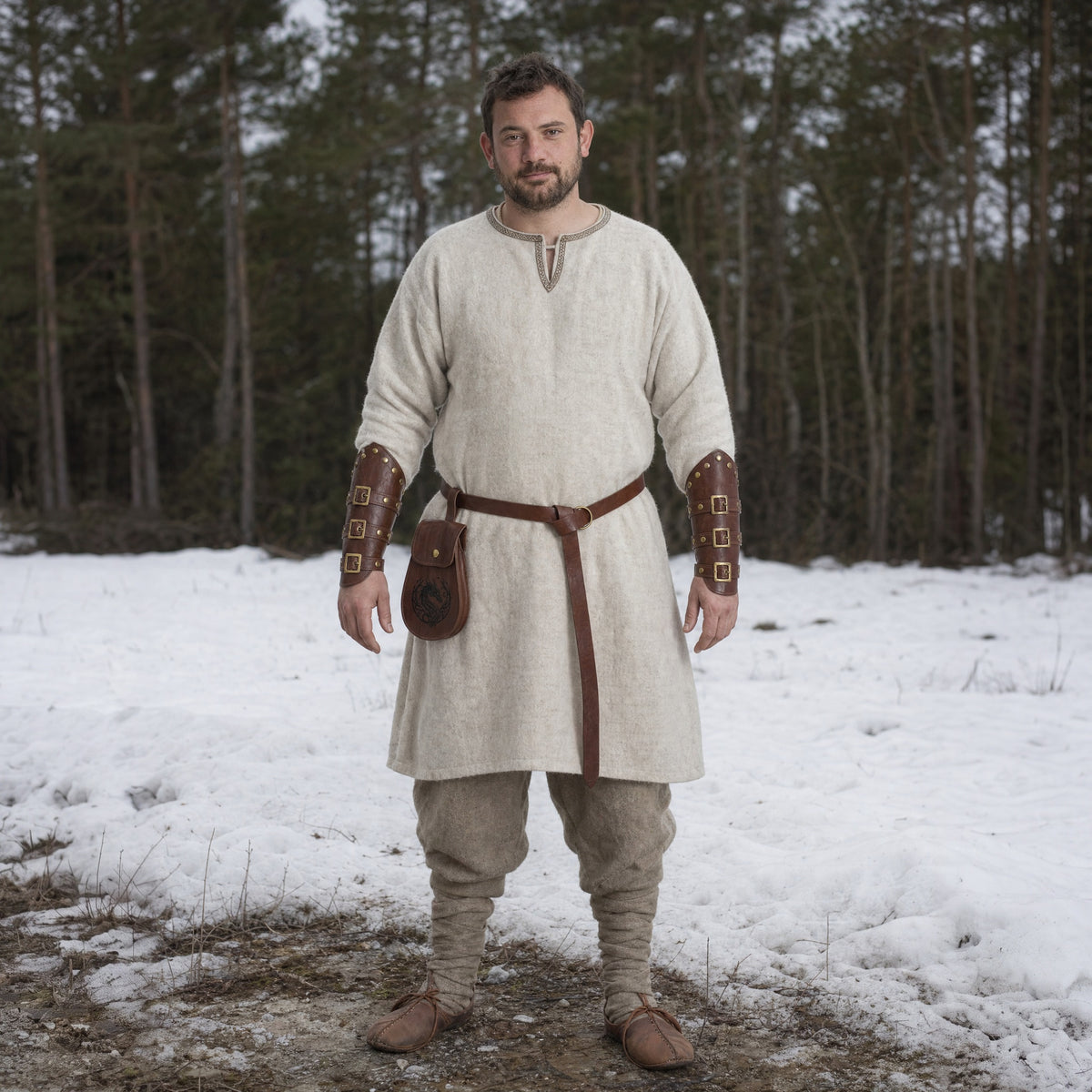 Brown Viking belt, pouch and bracers set worn outdoors, full-length front view