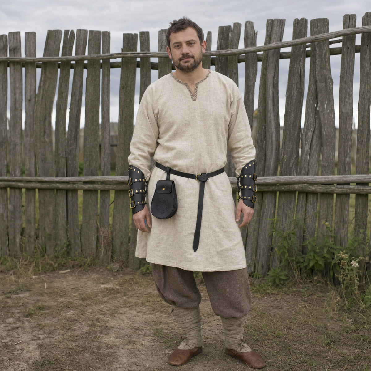 Black Viking belt, pouch and bracers set worn outdoors, full-length front view