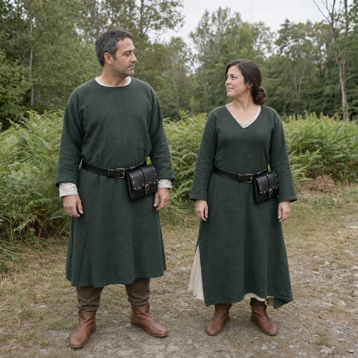 Black wide faux leather belt pouches worn by a man and a woman outdoors