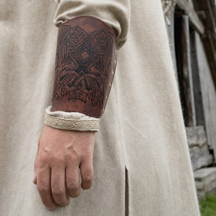 Winged beast rune bracer on a forearm, showing the 21.5 cm length from wrist towards elbow